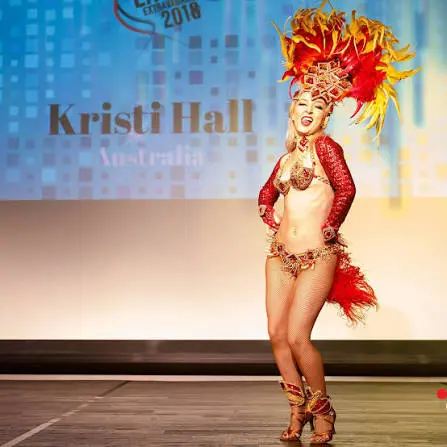 Kristi Hall performing Latin dance on stage